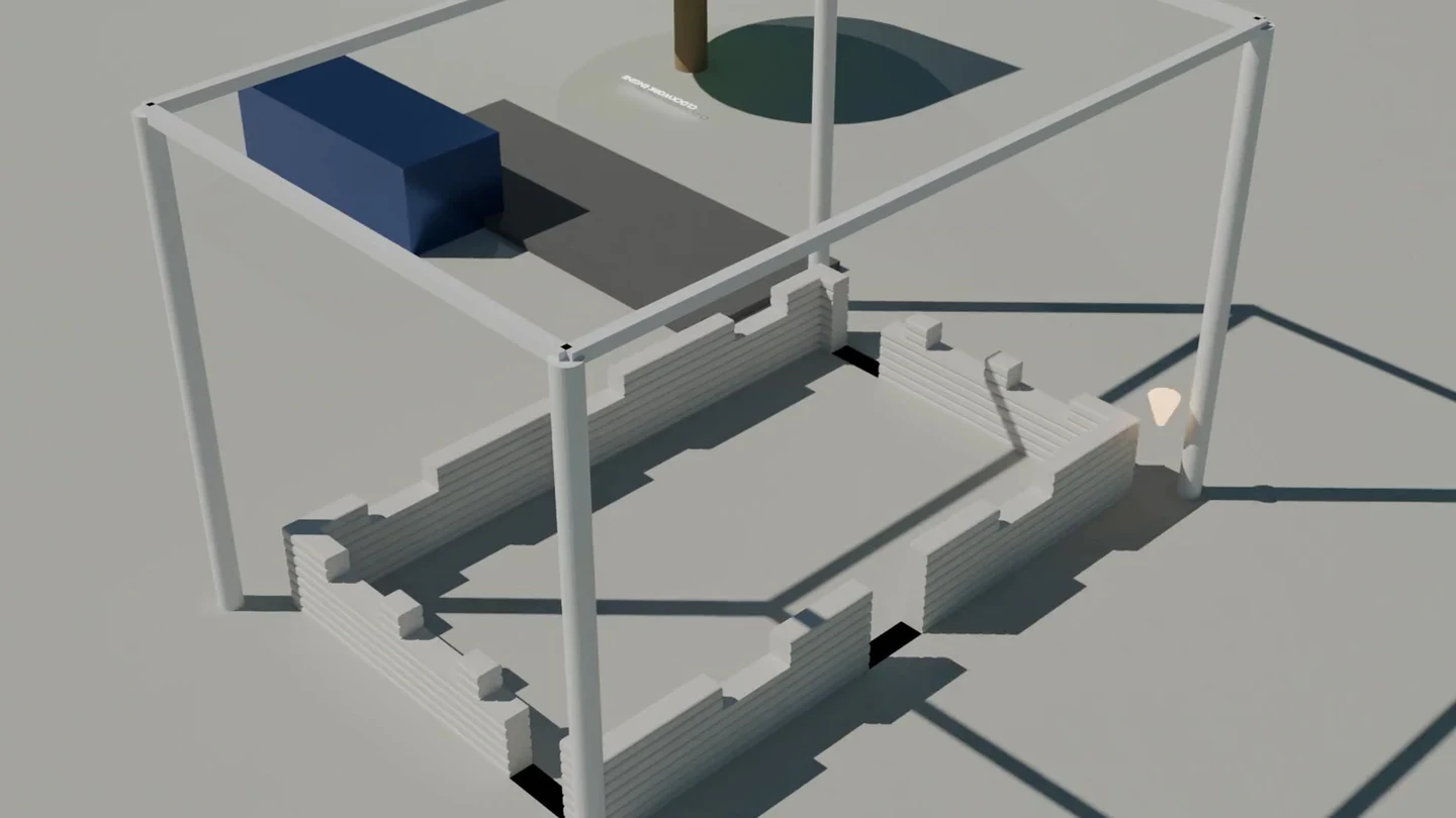 A full-scale concrete printer laying layers of a printed housing system.