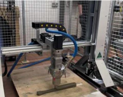 The print head and nozzle of a concrete printer.
