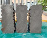A set of printed concrete test specimens.