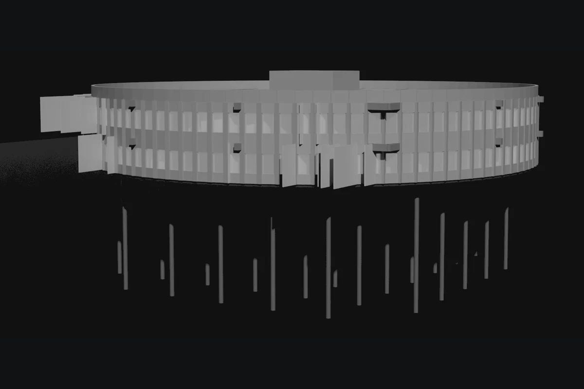 Circular school building form on a piled substructure.